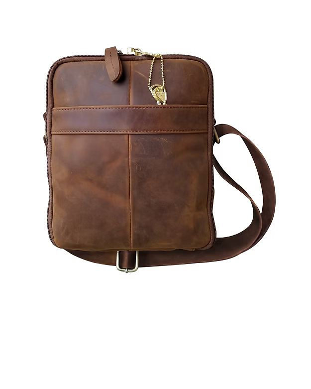 Brown leather crossbody bag on a white background
