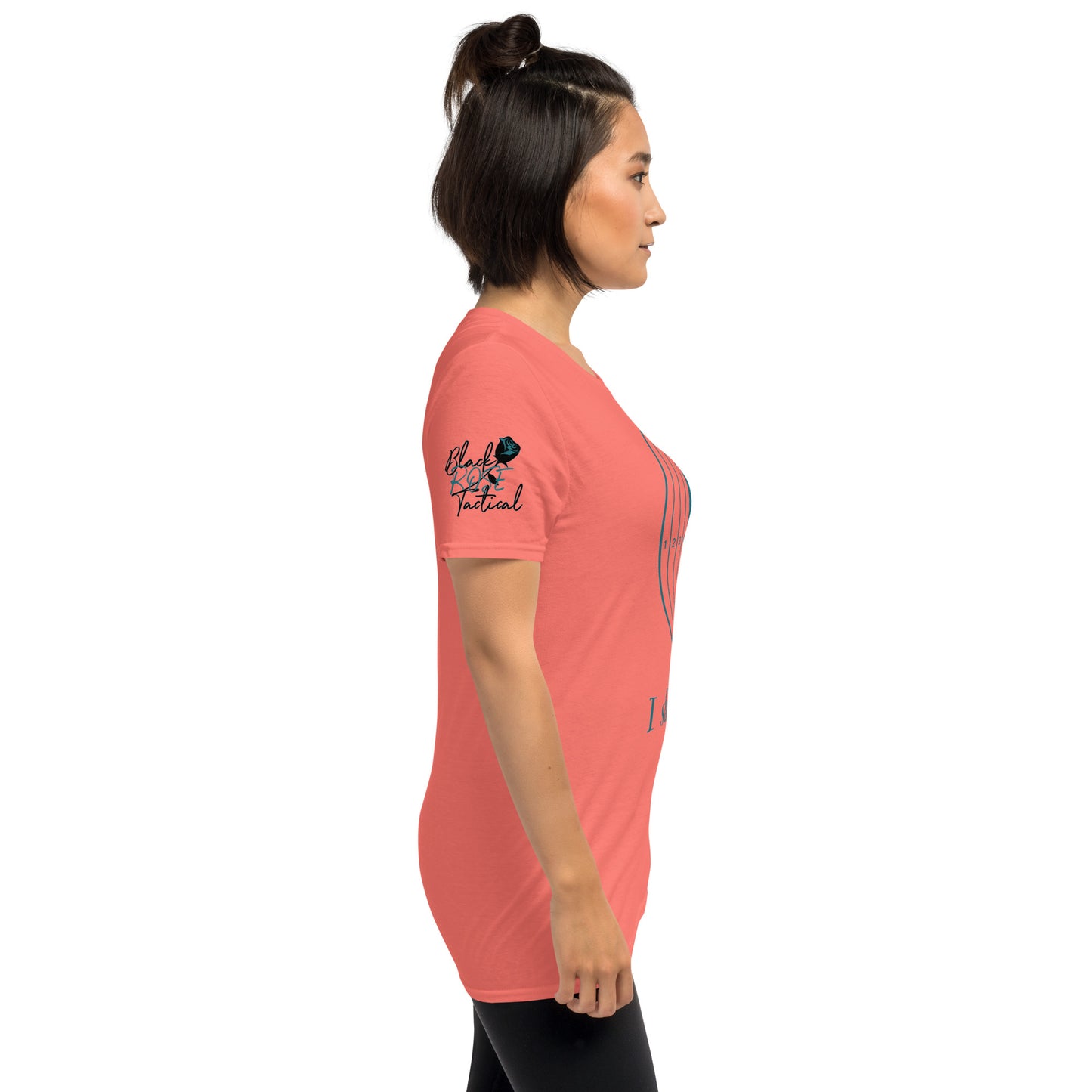 Woman wearing a coral t-shirt with text and graphics on a white background
