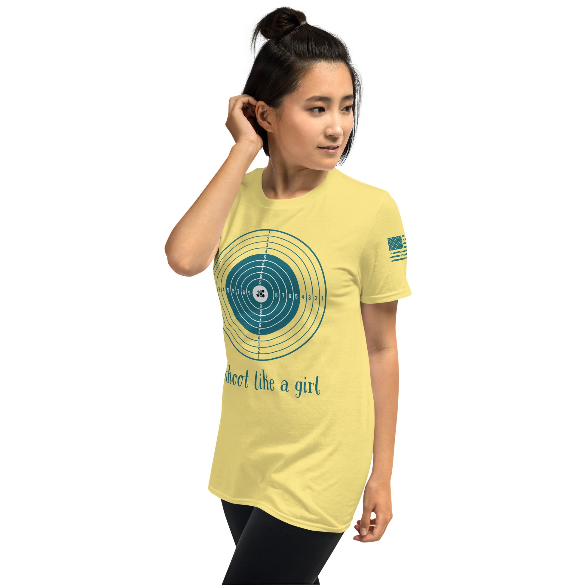 Woman wearing a yellow t-shirt with a graphic design and text on a white background