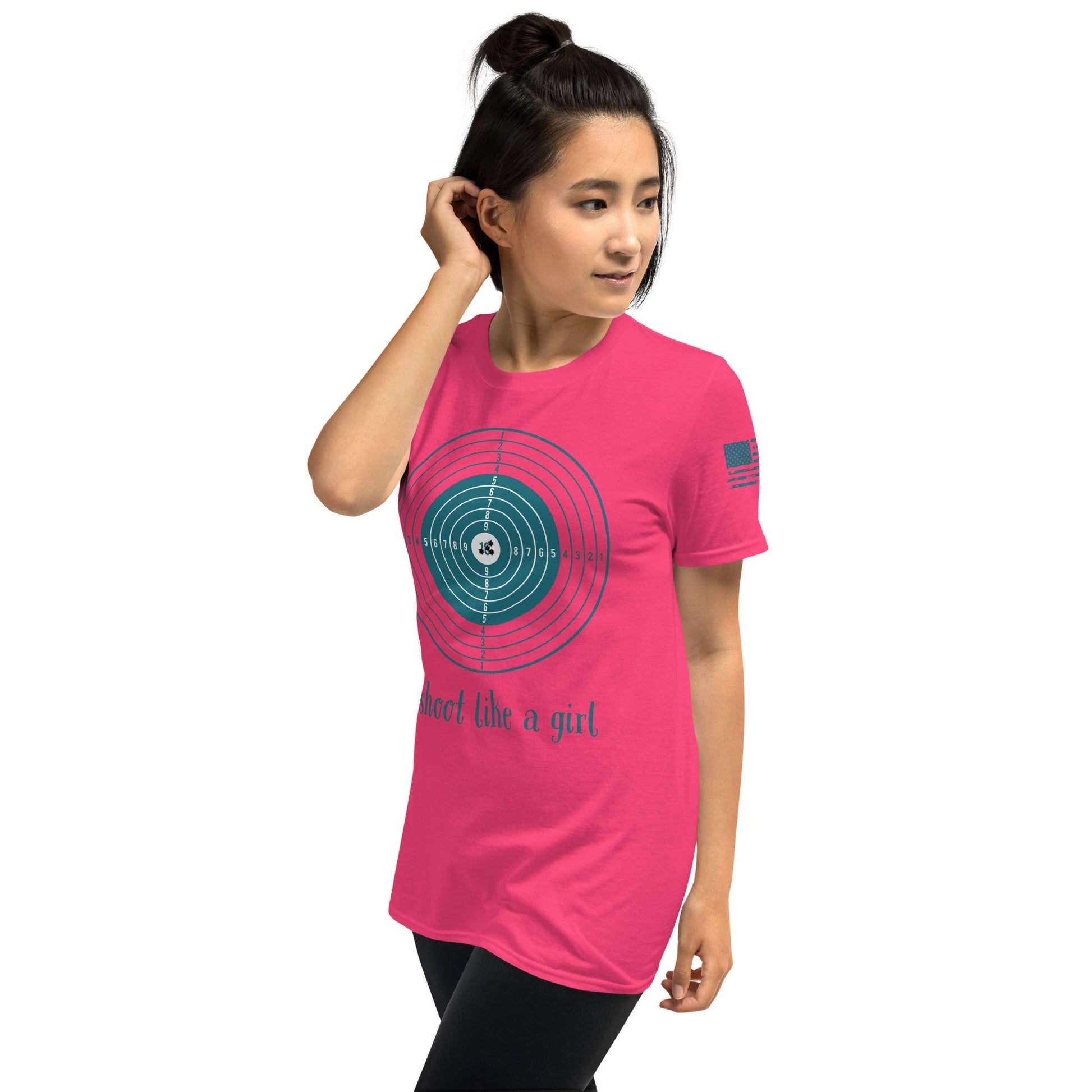 Woman wearing a pink t-shirt with a graphic design and text on a white background