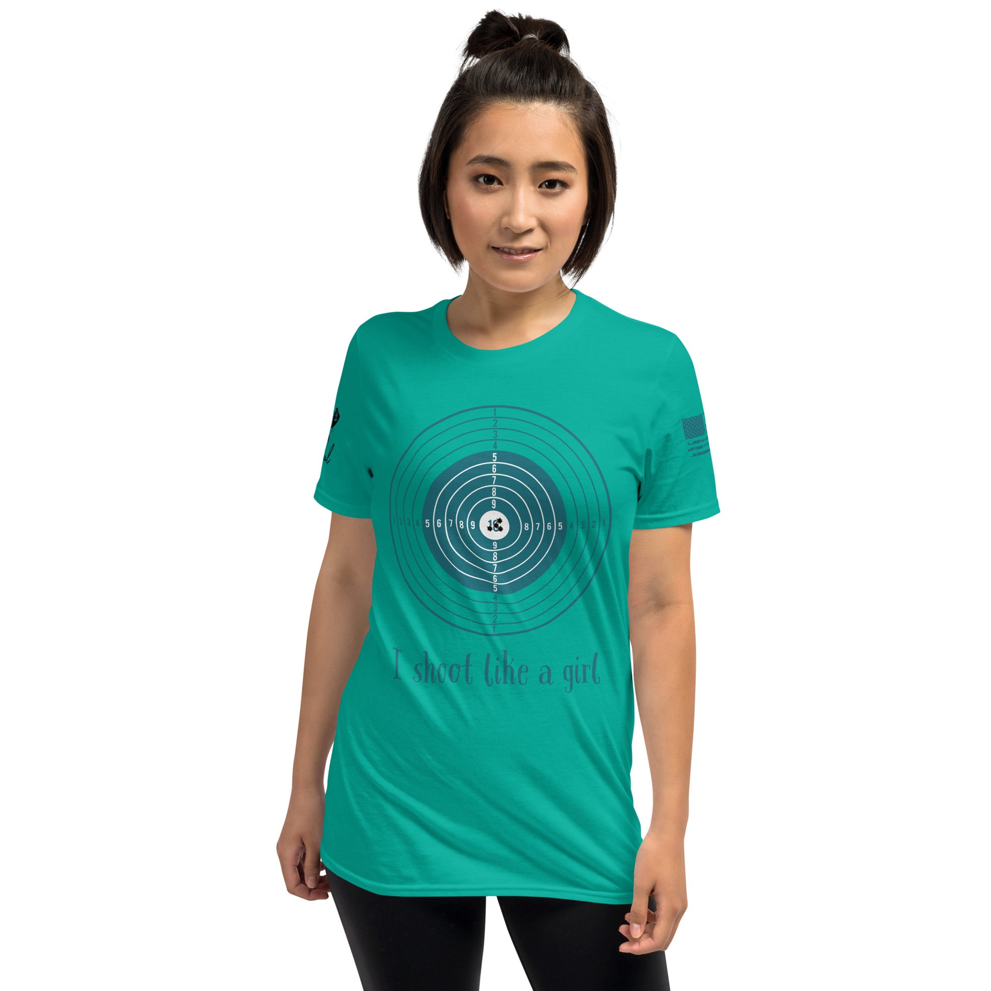 Person wearing a teal t-shirt with a circular design and text on a white background