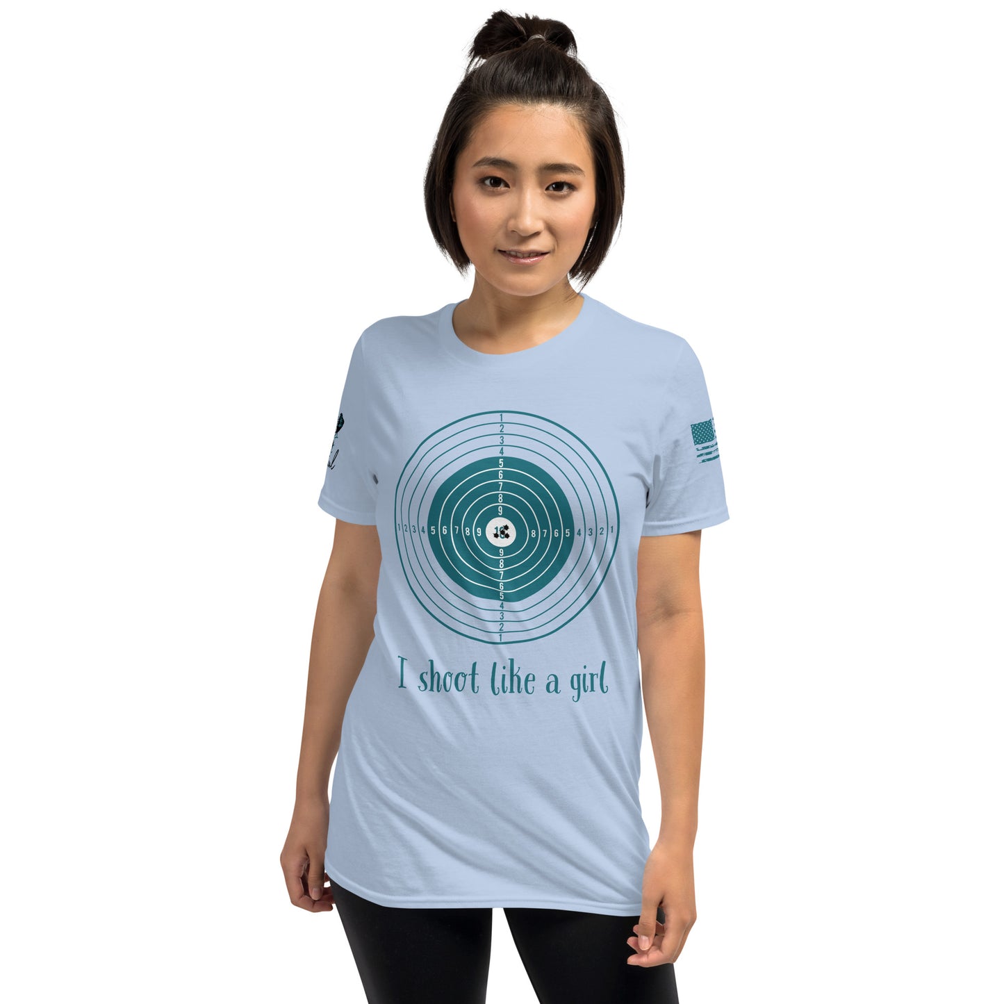 Woman wearing a light blue t-shirt with a graphic design and text on a white background