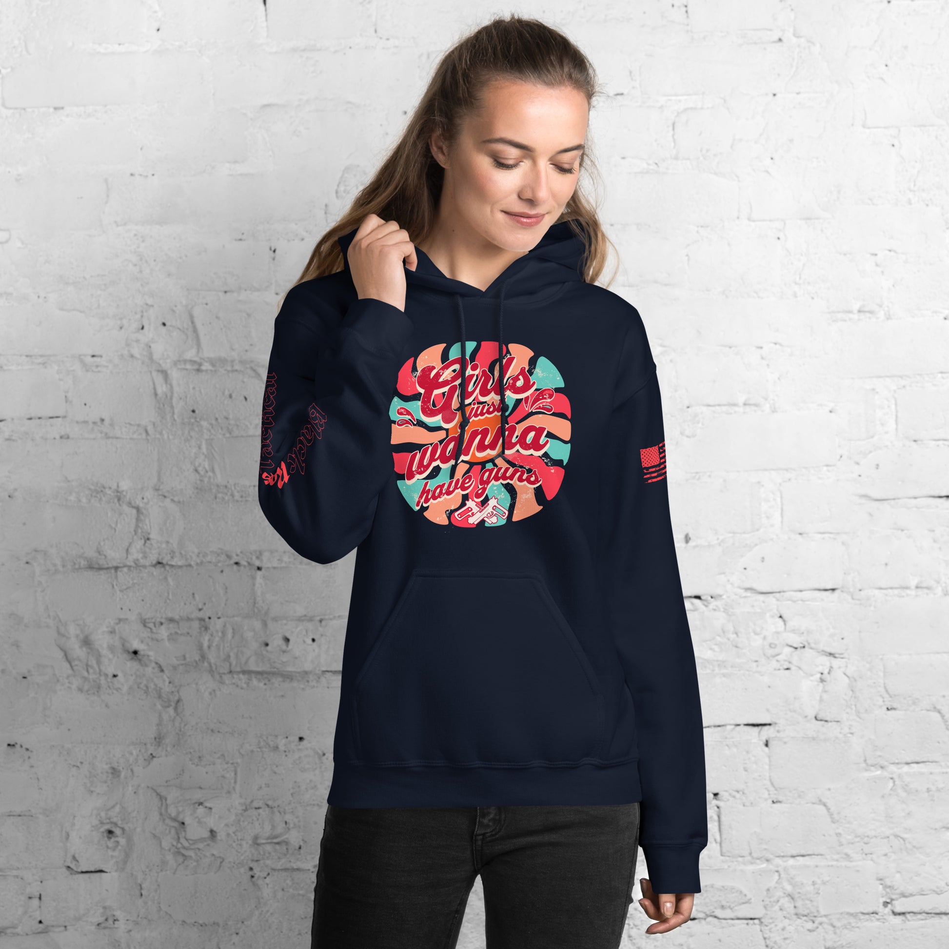 Woman wearing Girls Just Wanna Have Guns hoodie
