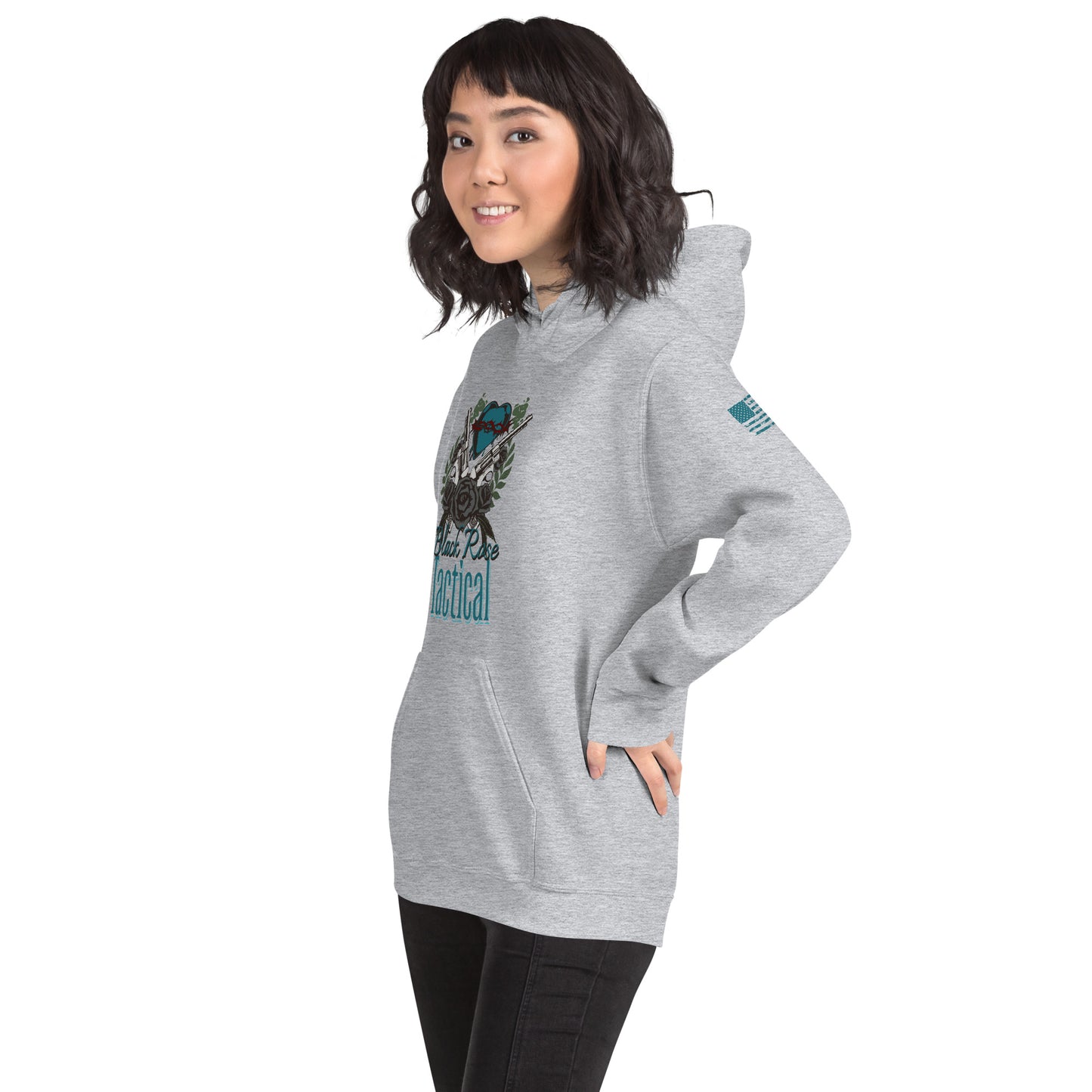 Woman wearing a gray hoodie with a graphic design on a white background