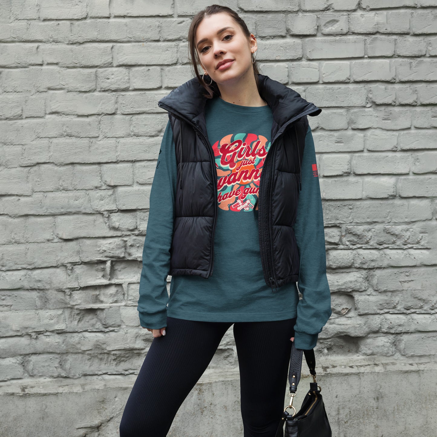 Woman showing gun rights pride in Girls Wanna Have Guns long sleeve tee