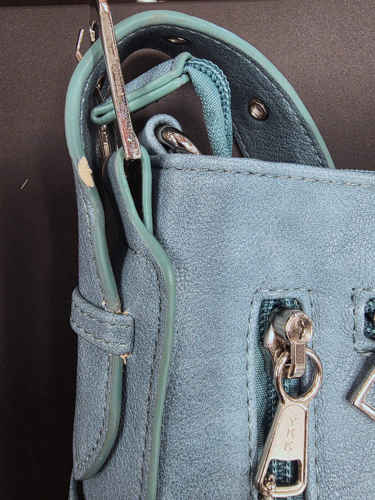 purse strap showing damage