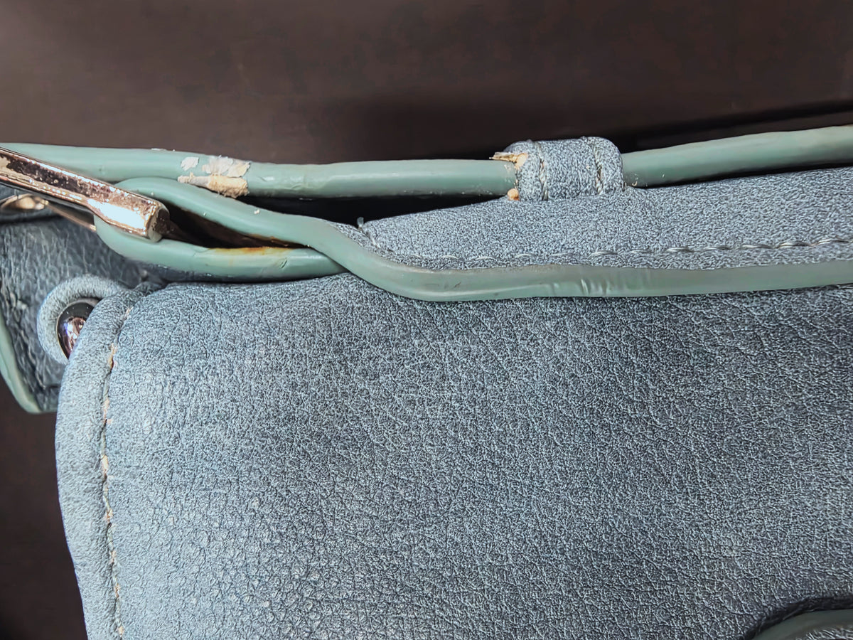 Damage to purse strap