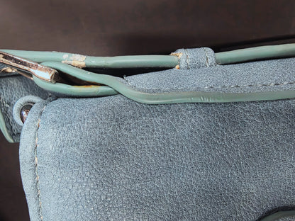 Damage to purse strap