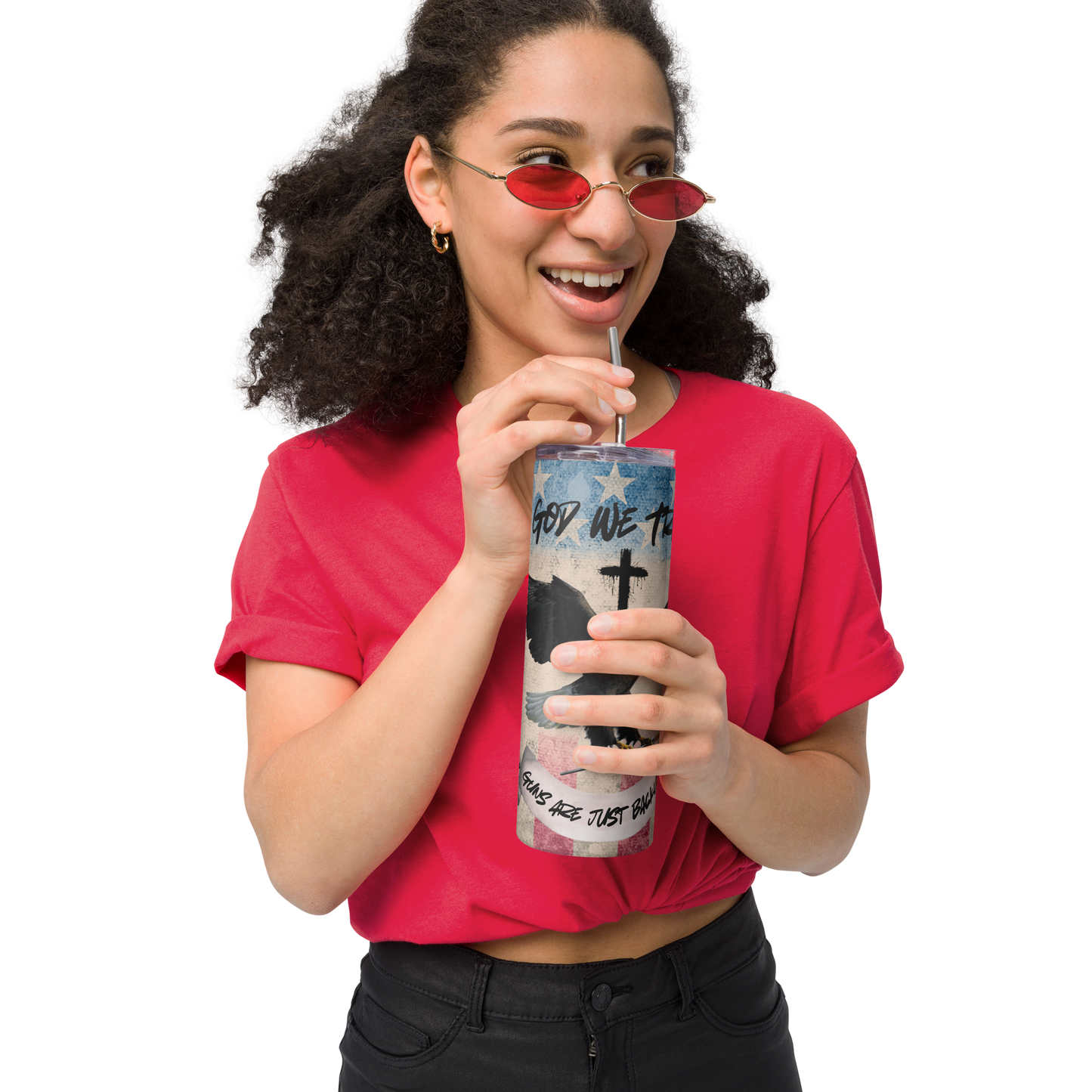 Person wearing a red shirt and sunglasses, holding a cup with a straw on a white background