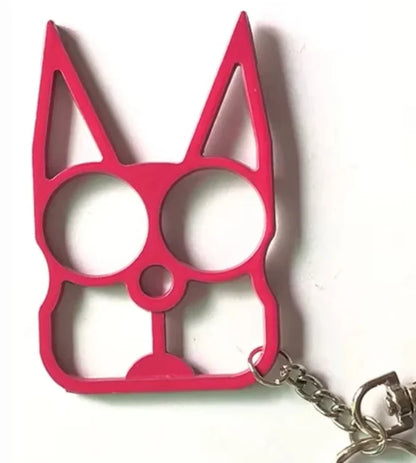 Pink cat-shaped keychain on a white background