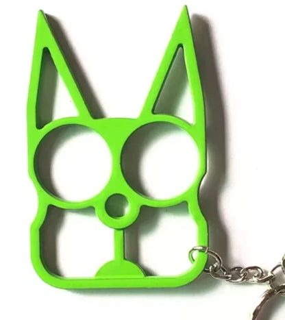Green cat-shaped keychain tool on a white background