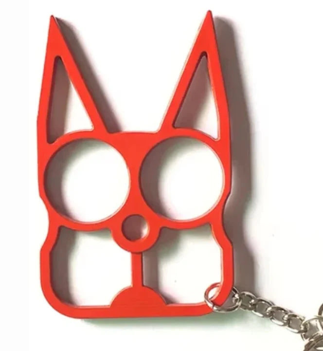 Red cat-shaped keychain on a white background