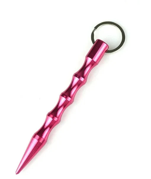 Pink keychain with a spear design on a white background