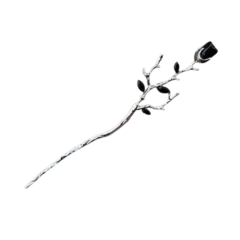 A silver-toned metal rose branch hair pin with a single black rose head and small black leaves, shown on a plain white background.