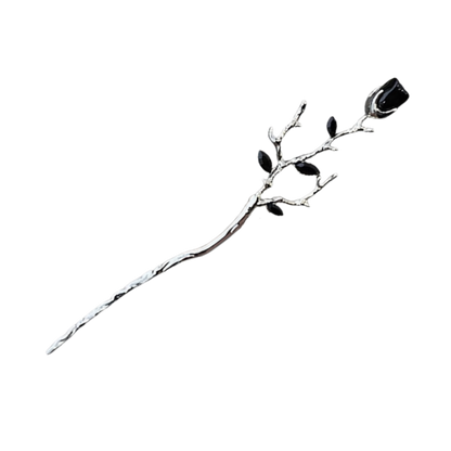 A silver-toned metal rose branch hair pin with a single black rose head and small black leaves, shown on a plain white background.