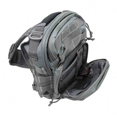 Close-up of MOLLE webbing and hook-and-loop patch panel on tactical utility bag.