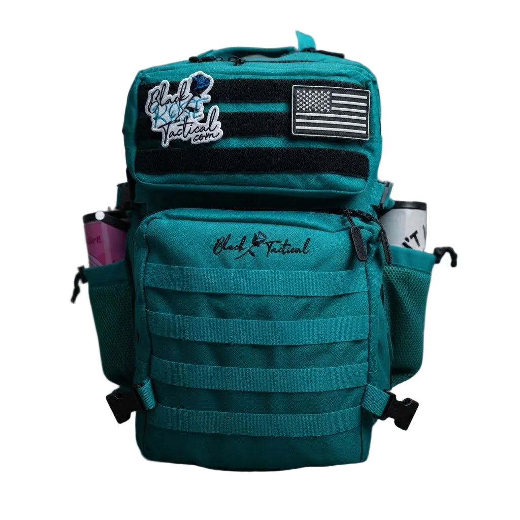 A teal tactical backpack with black webbing and a black American flag patch on the front, featuring the Black Tactical logo on the upper pocket and lower front, with side mesh pockets holding bottles, set against a dark gray studio background.