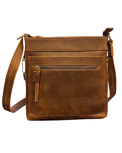Brown leather crossbody bag on a white background