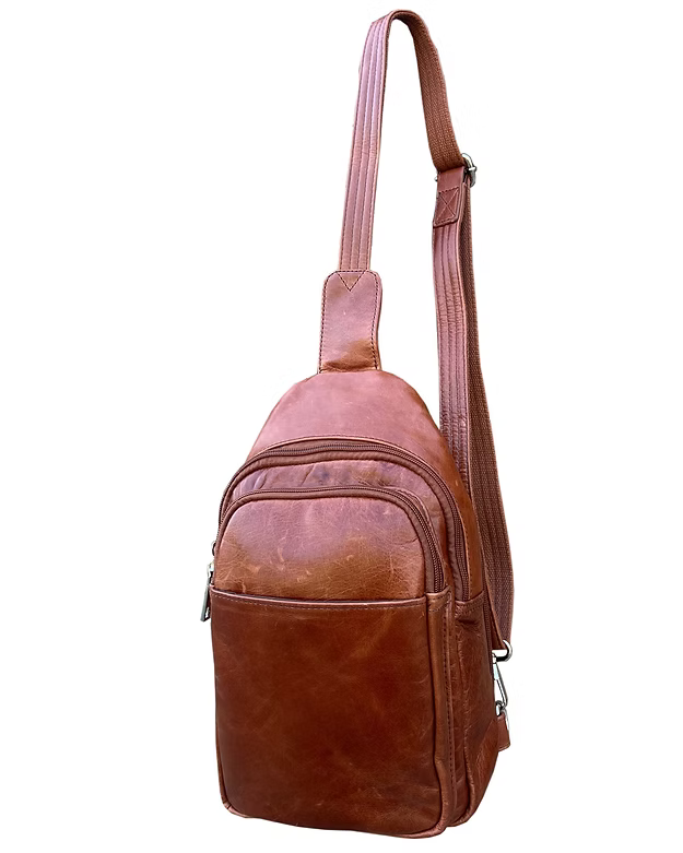 Brown leather sling bag on a white background