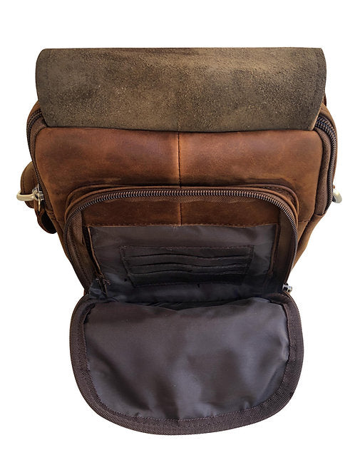 Brown leather bag with open front pocket on a white background