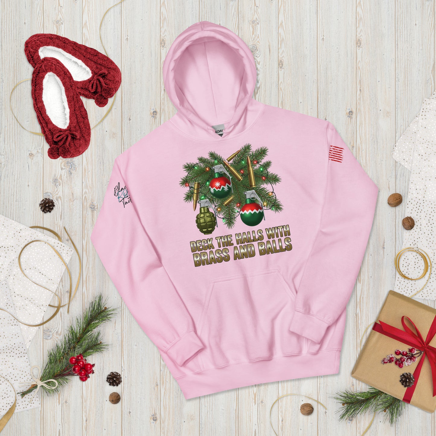 Deck the Halls with Brass and Balls sweatshirt featuring bold tactical Christmas design on front light pink