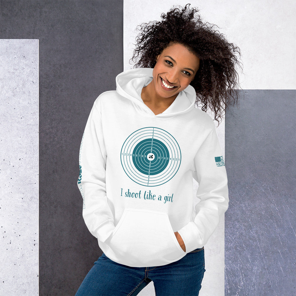 Woman wearing a white hoodie with a graphic design and text, standing against a gray and white background.