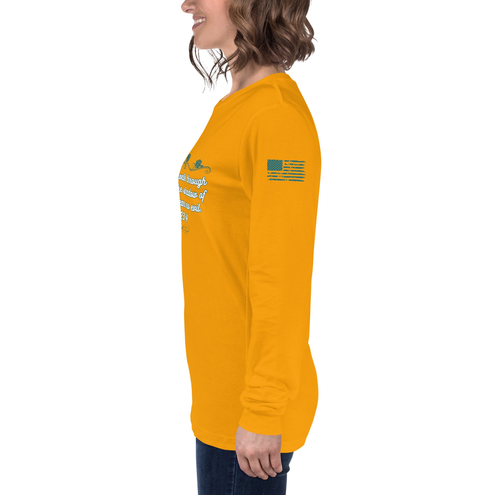 Side view of Psalms 23:4 faith long sleeve shirt on model left arm gold