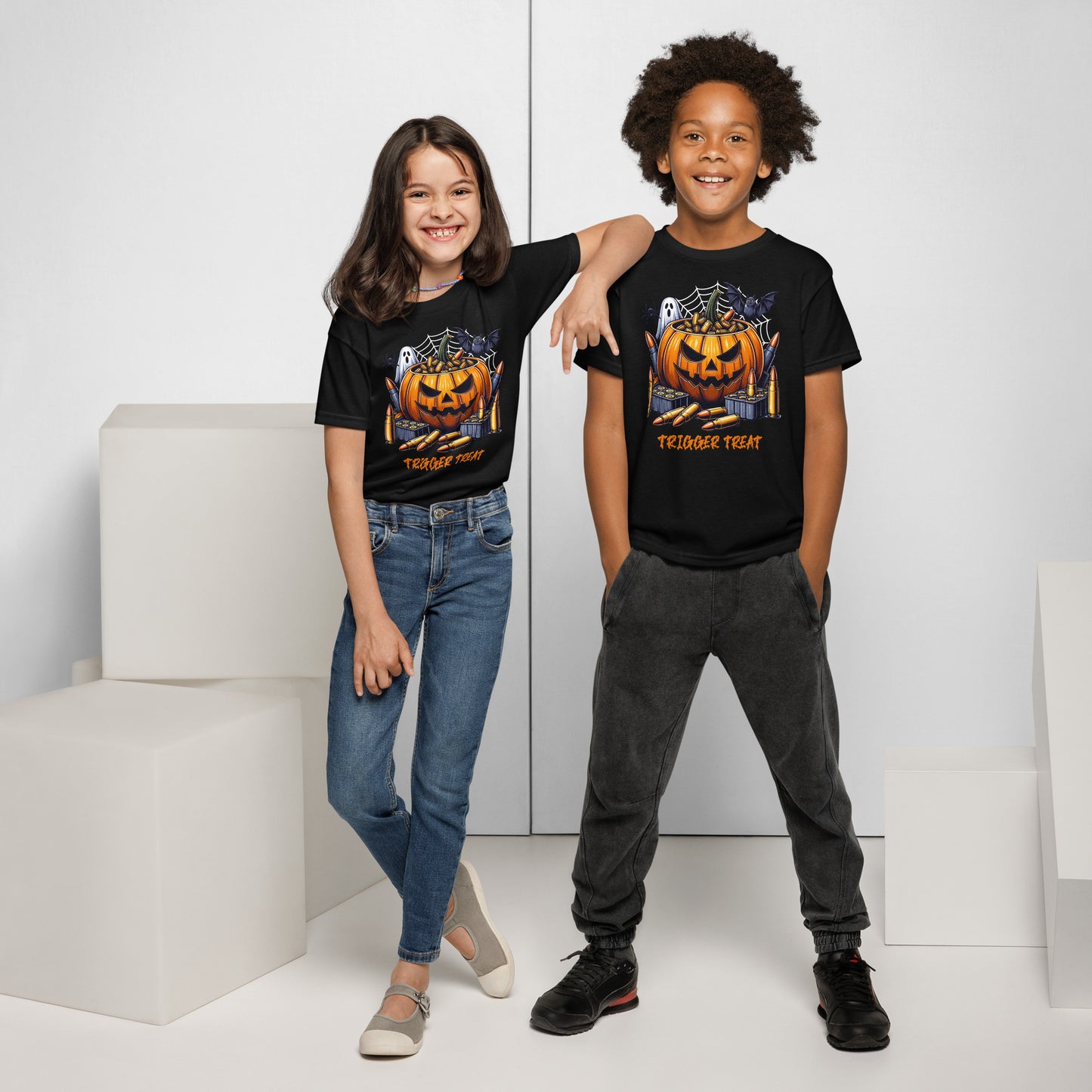 Kids Trigger Treat Halloween T-shirt with witch gun design, perfect for trick-or-treating and spooky season.