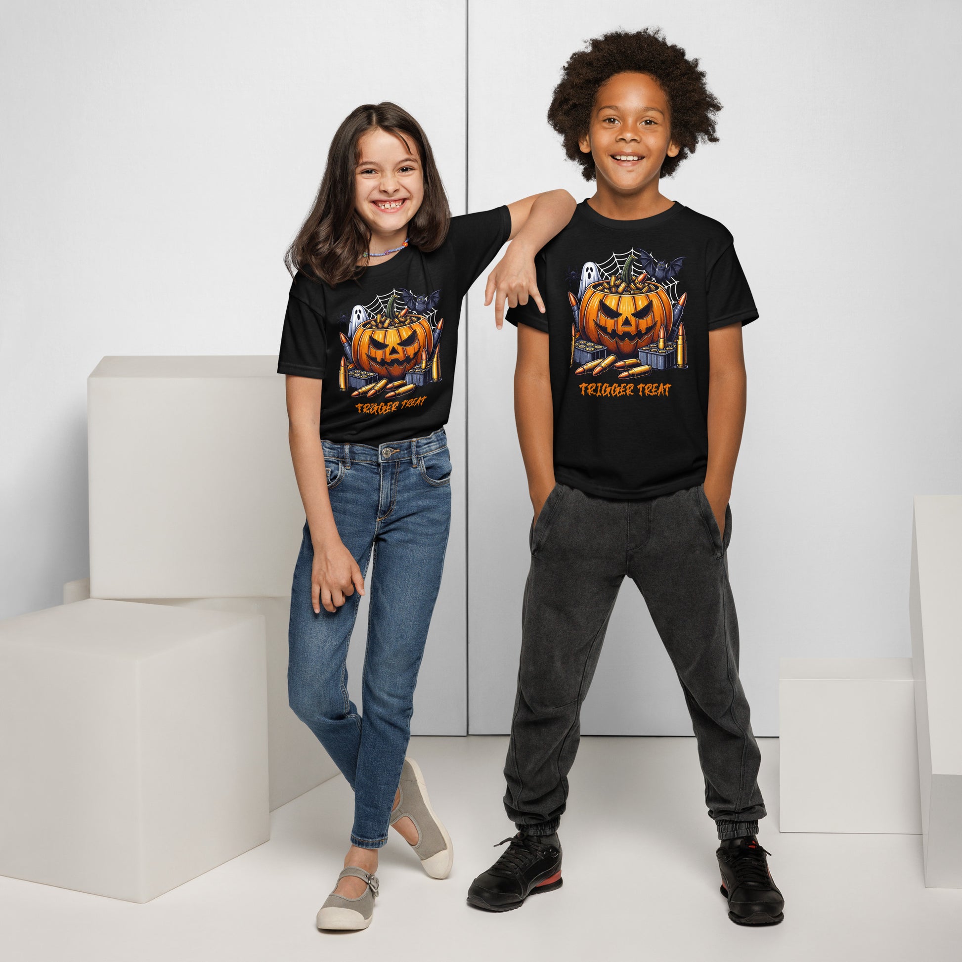 Kids Trigger Treat Halloween T-shirt with witch gun design, perfect for trick-or-treating and spooky season.